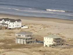   WS AERIAL ZO View of houses at beach / North Carolina, United States Stock Footage