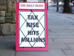 News Headline Board - Tax Rise Hit's Millions Stock Footage