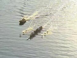 WS AERIAL ZI View of rowing team paracticing on Tennessee River / Chattanooga, Tennessee, United States Stock Footage