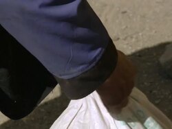 MS Salt trader salt bags putting out of house / Saldang village, High Himalayas, Upper Dolpo near Tibetan border, Nepal  Stock Footage