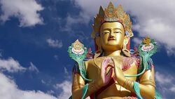 Time lapse at a 32 metre statue of Maitreya Buddha near Diskit Monastery facing down the Shyok River towards Pakistan in Nubra Vally, India Stock Footage