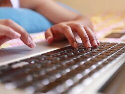 Woman using laptop Stock Footage