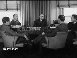 1939: TIME & LIFE MANAGING EDITORS:  VS Time Life managing editor & editors sitting in office talking (group journalism), including Henry Luce (1898-1967), Frank Norris, & T.S. Matthews. Rockefeller Center Instructional Video