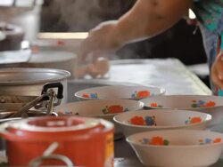 Chef cooking noodles in Asian restaurant kitchen Stock Footage