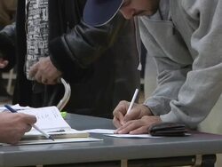 November 2, 2010 ZO Voters signing in to receive their ballots for the midterm election / Dearborn, Michigan, United States Stock Footage