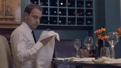 MS Waiter cleaning wine glass in restaurant Stock Footage
