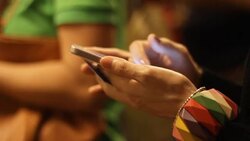 Crowded people in the mass public transportation using their phone Stock Footage
