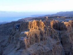 Aerial Masada at sunrise, Judea desert, Israel Stock Footage