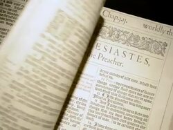 CU Leafing through pages of first edition of King James Bible / England Stock Footage