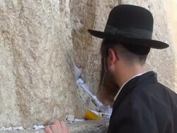 MS Jewish prayer kissing Wailing Wall after prayer / Jerusalem, Mechoz Jeruschalajim, Israel Stock Footage