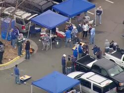 MS AERIAL Shot of Car parking area with people on Wallace Wade Stadium / North Carolina, United States Stock Footage