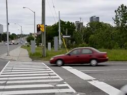Coca Cola distribution truck in city intersection Stock Footage