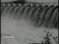 1943: SWEDEN: TRANSPORTATION: XWS Electric train moving on track. WS Train w/ ore bins. FARMING: Farmers loading hay on wagon, horses pulling wagon. VS Small reaper & farmer using tractor, cutting field. Government sponsored Instructional Video