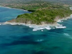 AERIAL View of coastline surrounded by ocean / Guanacaste, Costa Rica Stock Footage