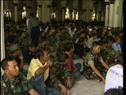 Prayers at Mosque which survivied tsunami News Clip