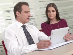 HD: Young Manager Giving Instructions To Assistant Stock Footage