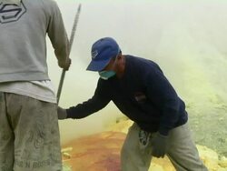 MS Men extracting sulfur from the Ijen volcano complex / Ijen, Java, Indonesia Stock Footage