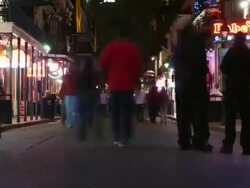WS T/L Cars and people on Burbon Street / New Orleans, Louisiana, USA Stock Footage