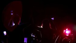 Crowd waving arms holding cell phones at concert Stock Footage