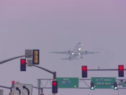 MS TS Plane above traffic light and retracting wheels / Mineapolis, MINESOTA, United States Stock Footage