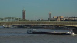 Rhine River, Deutz Bridge, Hohenzollern Bridge and Fair Tower, Cologne, North Rhine-Westphalia, Germany Stock Footage