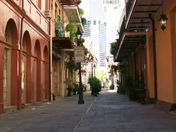 Medium Shot - Narrow pedestrian walkway in between two buildings / New Orleans Louisiana Stock Footage
