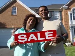 Happy Couple Holding SALE Sign Stock Footage