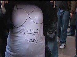 Around 10,000 women marched through central Cairo demanding Egypt's ruling military step down Tuesday in an unprecedented show of outrage over soldiers who dragged women by the hair and stomped on them, and stripped one half-naked in the street during a fierce crackdown on activists the past week. News Clip