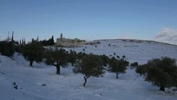 Time Lapse, Mar Elias Monastery with olive trees in winter snow, Jerusalem Stock Footage