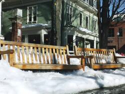 MS Shot of two empty seating benches on sidewalk covered with snow / Boston, Massachusetts, United States Stock Footage