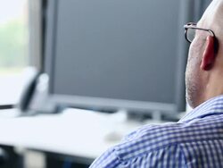 MS PAN TD Businessman and mature businessman sitting in discussion in office workstation/Washington, USA Stock Footage