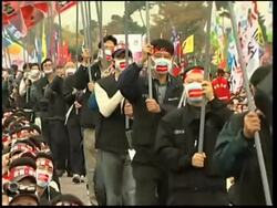 Thousands protest against govt work policies News Clip