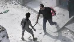 CLEAN : Greek mayor warns of 'bloodshed' as police beat migrants News Clip