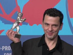 Christian Petzoldat, winner of best director at Winners Press Conference Reactions:at the Grand Hyatt on February 18, 2012 in Berlin, Germany. Stock Footage