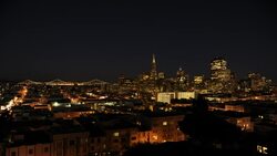 City lights twinkle along San Francisco Bay. Stock Footage