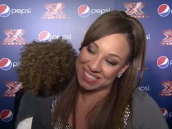 INTERVIEW: Melanie Amaro on how she feels to have made the top 10, what it meant to have L.A. Reid apologize to her and if she every imagined starring in a Pepsi Super Bowl commercial. Stock Footage