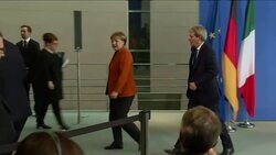 Merkel and Gentiloni walk from press conference News Clip