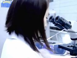 Looking Through a Microscope Stock Footage