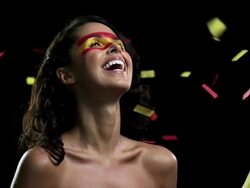Woman with red and yellow face and ticker tape Stock Footage