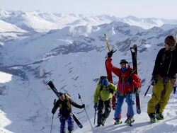 Ski Moutianeers Celebrate On Alaskan Peak Stock Footage