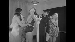 Female students model bathing suits at Success School at Richard Hudnut Beauty Salon in NY City News Clip