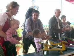 woman play with her son the game with frogs Stock Footage