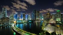 View from Brickell Key, a small island covered in apartment towers, towards the Miami skyline, Miami, Florida, USA - Time lapse Stock Footage