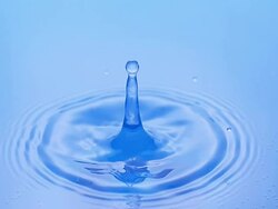 CU SLO MO Shot of Drop of Water falling into Water / Vieux Pont en Auge, Normandy, France  Stock Footage