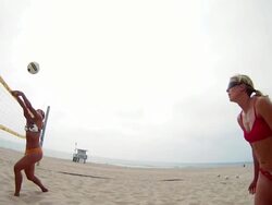WS POV SLO MO Women playing beach volleyball / Redondo Beach, California, United States Stock Footage