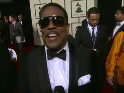 INTERVIEW - Charlie Wilson on attending as both a presenter and a nominee and the story on how he ended up writing a gospel song. at 56th Annual Grammy Awards - Arrivals Interviews Stock Footage