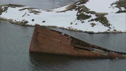 A shipwreck sticks out of Alaska's Dutch Harbor. Stock Footage
