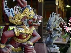 MS Wood carving Temple guardian in front of Palace Puri Saren / Ubud, Bali, Indonesia Stock Footage