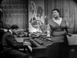 B/W 1955 Ella Fitzgerald singing "Between the Devil + Deep Blue Sea" / The Larry Finley Show Stock Footage