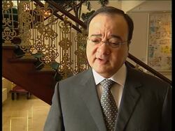 Palestinian comment to headlines, shots of barrier News Clip